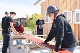 Huntley High students build their own classroom