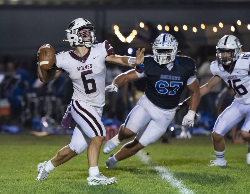 Prairie Ridge's Luke Vanderwiel looks to pass during their game against Burlington Central on Friday, September 19, 2025 at Burlington Central High School. Ryan Rayburn for Shaw Local