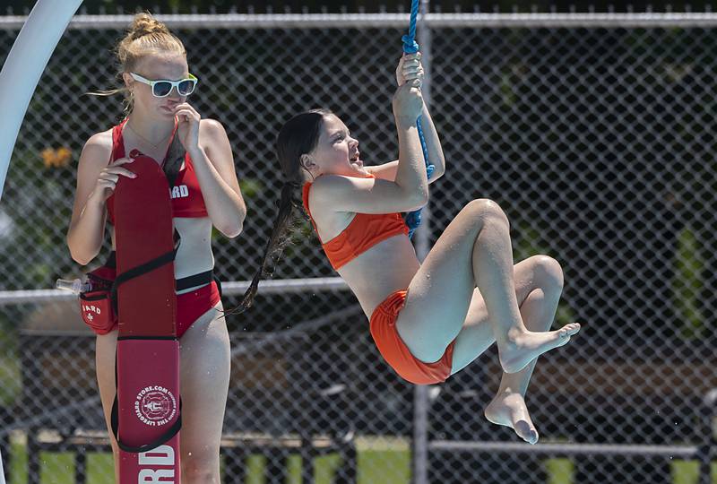 Kerrigan Becker, 9, of Polo swings from a zipline Wednesday, June 5, 2024 during the summer opener of the Polo pool.