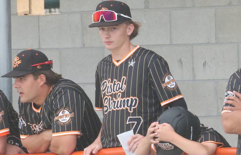 Illinois Valley Pistol Shrimp's Izzaq Zrust of Ladd, watches the team play the Alton River Dragons from the dugout on Thursday, June 5, 2025 at Schweickert Stadium in Peru.