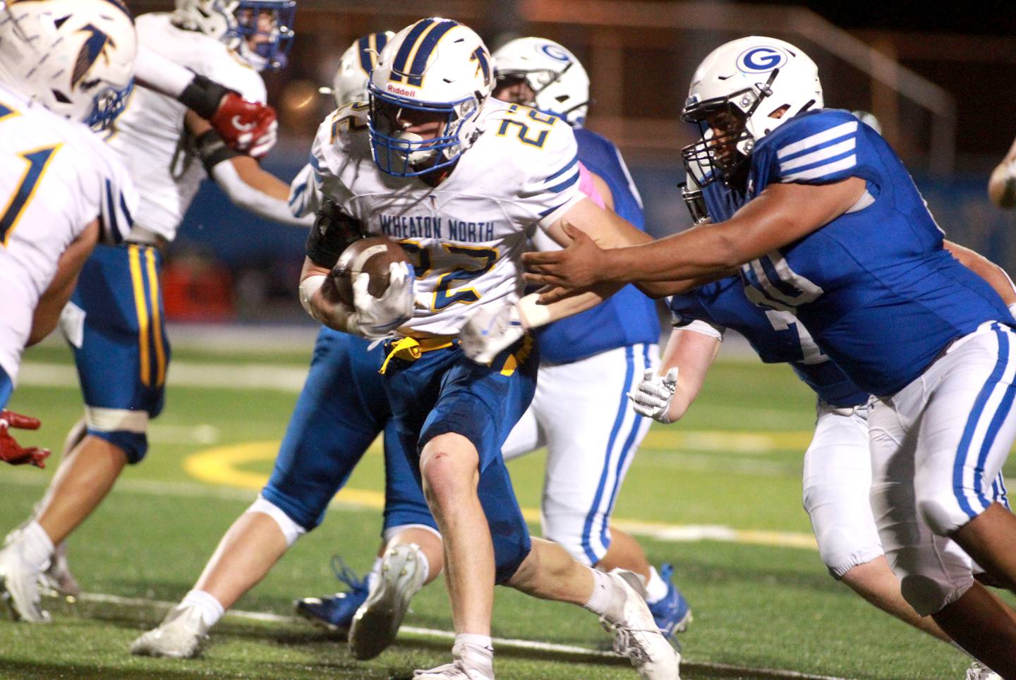 Wheaton North’s Nik Schaafsma runs the ball during a game on Friday, Oct. 11, 2024 at Geneva.
