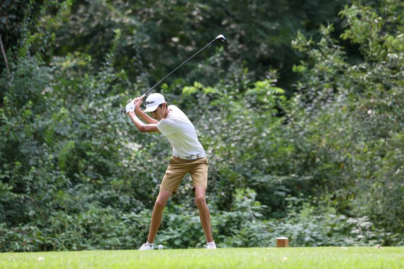 Beecher's Peyton Serafin hits into the fairway during the Bill Breeden All-Area Classic on Monday, Aug. 18, 2025. Serafin would earn first place individually, tallying a 78 to help the Bobcats to their fifth consecutive win in the event.