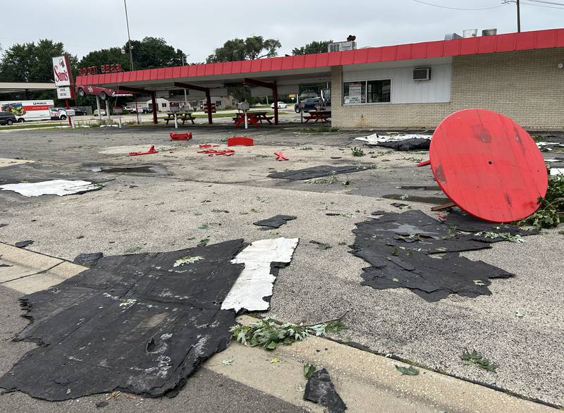 Debris from Sam's Drive In lays on the ground Tuesday, July 16, 2024 following Monday night's storm. The Byron drive-in is for sale and did not open for business this year.