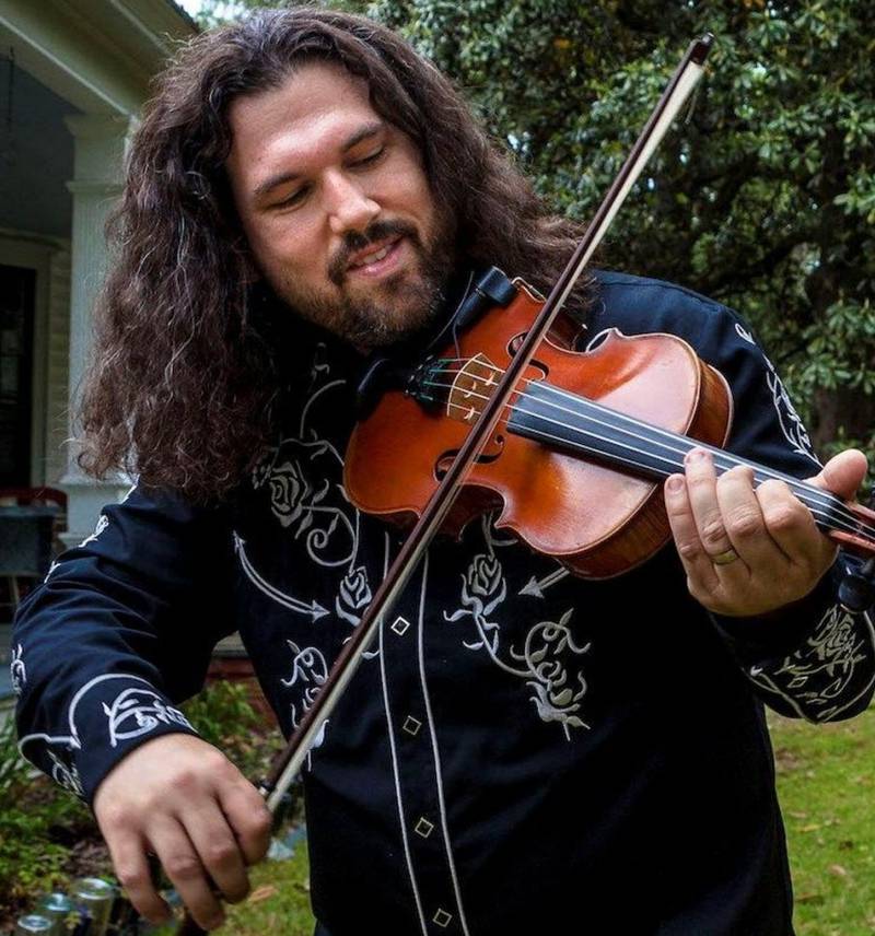 French Creole fiddler and presenter Dennis Stroughmatt