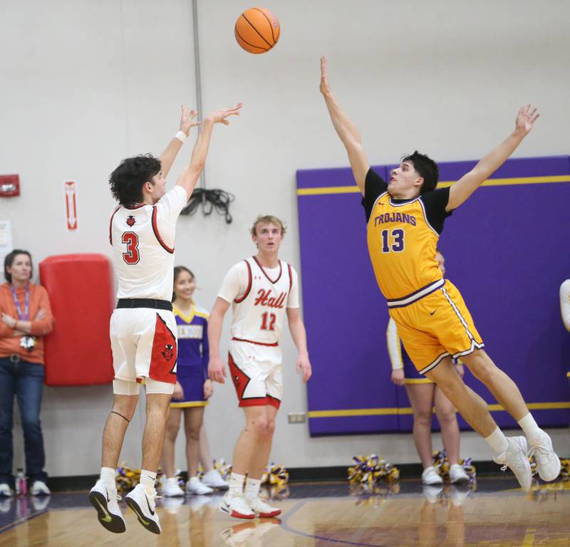 Hall's Noah Plym shoots a jump shot over Mendota's Oliver Munoz on Tuesday, Feb. 3, 2026 at Mendota High School.