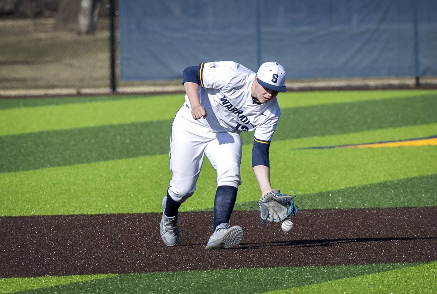 Sterling’s Drew Nettleton fields a ball at third base against Rock Falls Tuesday, March 28, 2023.