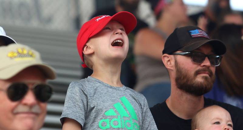 Ben Mertes, 5, of Cary cheers for tractors to make a full pull on the final day of the 2025 McHenry County Fair in Woodstock on Sunday, August 3, 2025. “The tractors are cool,” said Mertes, “I like it when they do wheelies.”
