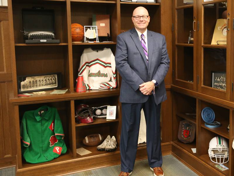 La Salle-Peru Township High School superintendent Steve Wrobleski poses for a photo in the alumni room on Thursday, Oct. 3, 2024 at La Salle-Peru Township High School. Wrobleski is retiring at the end of the 2025-2026 school year.
