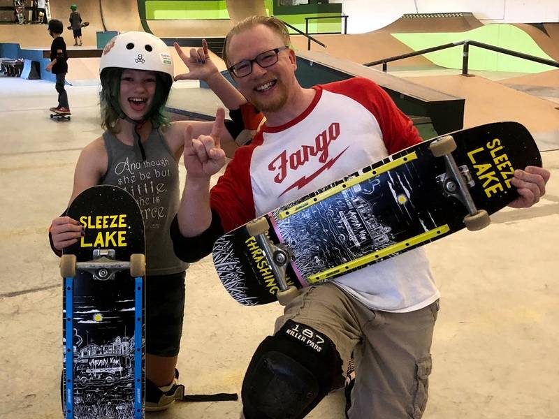 Ron Adamson of DeKalb is raising $5,000 now through Thursday, May 5, for Pushing Together NFP. On Saturday, May 7, Adamson, right, will skateboard from downtown Somonauk to downtown Genoa, about 40 miles in total. His 12-year-old daughter Esther, left, has also volunteered to skate on May 7, as well as Greg Roberts from Pardon My Thrashing Skateboard in Chicago. (Photo provided by Ron Adamson)