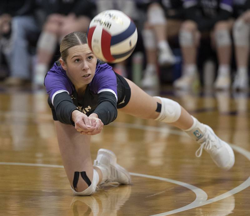 Dixon’s Morgan Hargrave digs a shot against Rochelle Monday, Oct. 28, 2024, during regional play in Dixon.