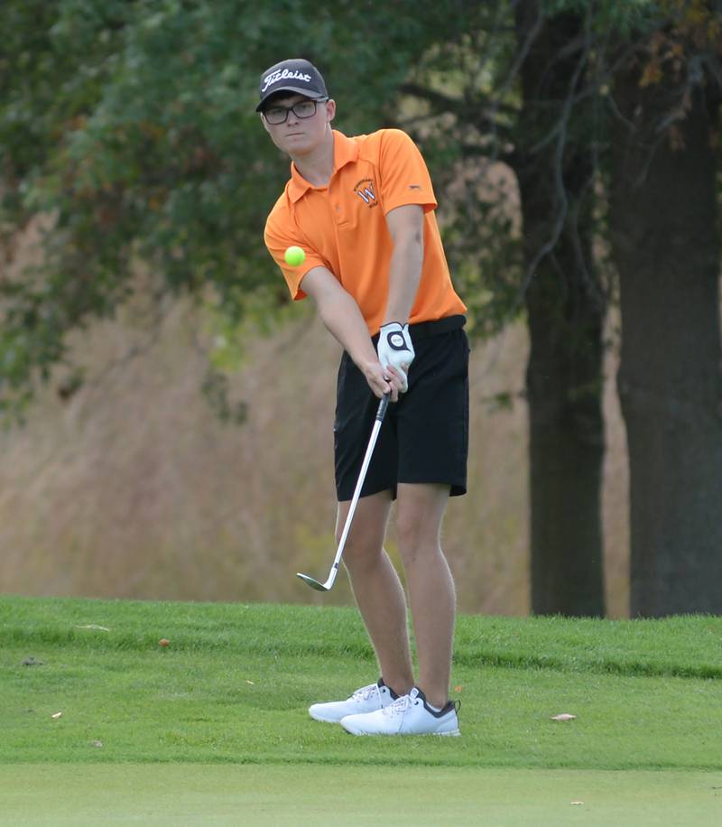Winnebago's Adam Dimke chips on to a green during the 1A Pearl City Regional on Wednesday, Oct. 1, 2025 at Wolf Hollow Golf Course in Lena.