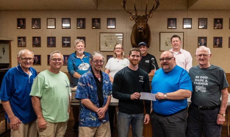 Peru Police Officer Brendan Sheedy accepts a check from Oglesby Elks Exalted Ruler Sam Sankovich. Oglesby Elks Lodge 2360 donated $2,000 to local police departments as part of the “Beyond the Horizon, Linked Autism Safety Project,” according to a press release issued Sunday, Sept. 1, 2024.