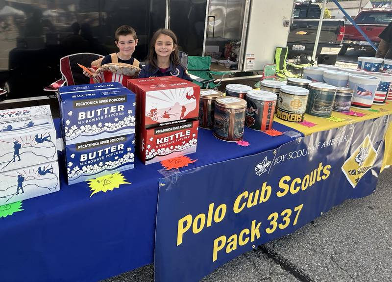 Jeffrey Lance Jr., 6, and Emersyn Arbogast, 7, of Polo, were all smiles as they sold popcorn at the Polo Cub Scouts Pack 337 booth at the annual Polo chili cook off on Saturday, Sept. 27, 2025.