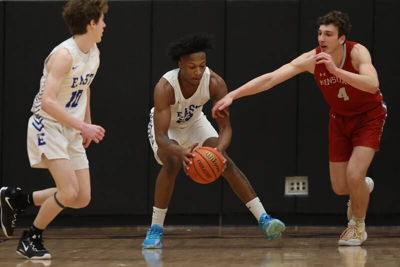 Lincoln-Way East’s George Bellevue recovers the loose ball against Hinsdale Central in the Lincoln-Way West Warrior Showdown on Saturday January 28th, 2023.