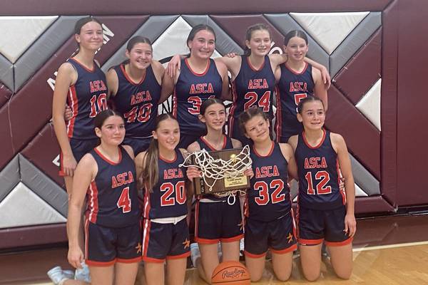 Carlo Acutis seventh grade girls basketball wins regional title