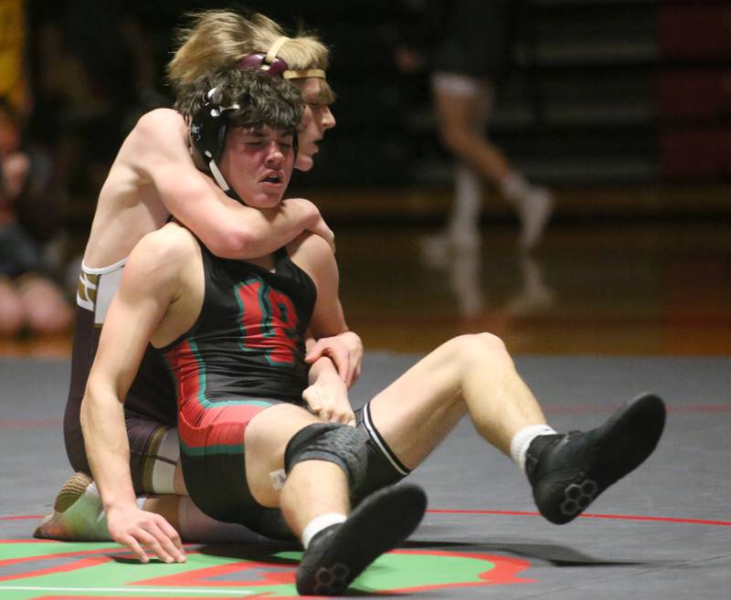 Morris's Andrew Petersonl wrestles L-P's Caleb Plut on Thursday, Jan. 11 2024 in  Sellett Gymnasium.