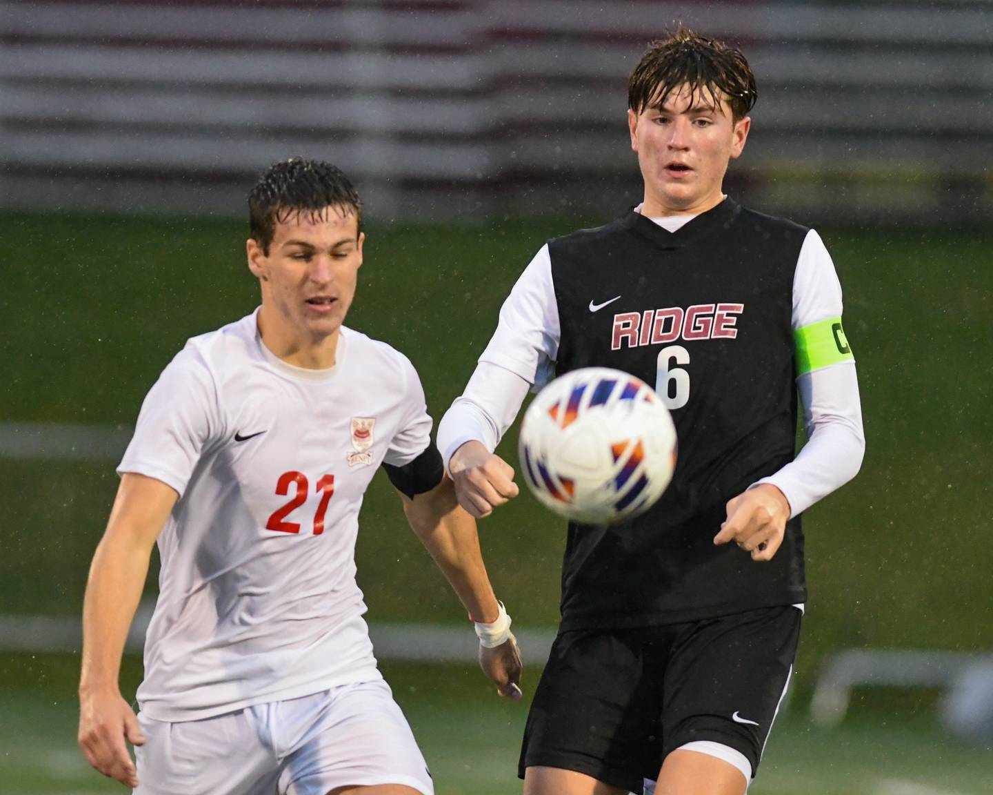 Benet Academy's Brendan Bergnach (21) and Prairie Ridge's Matthew Rireng (6) battle for the ball during the class 2A super sectional soccer match on Tuesday Nov. 5, 2024, held at Wheaton Academy in West Chicago.