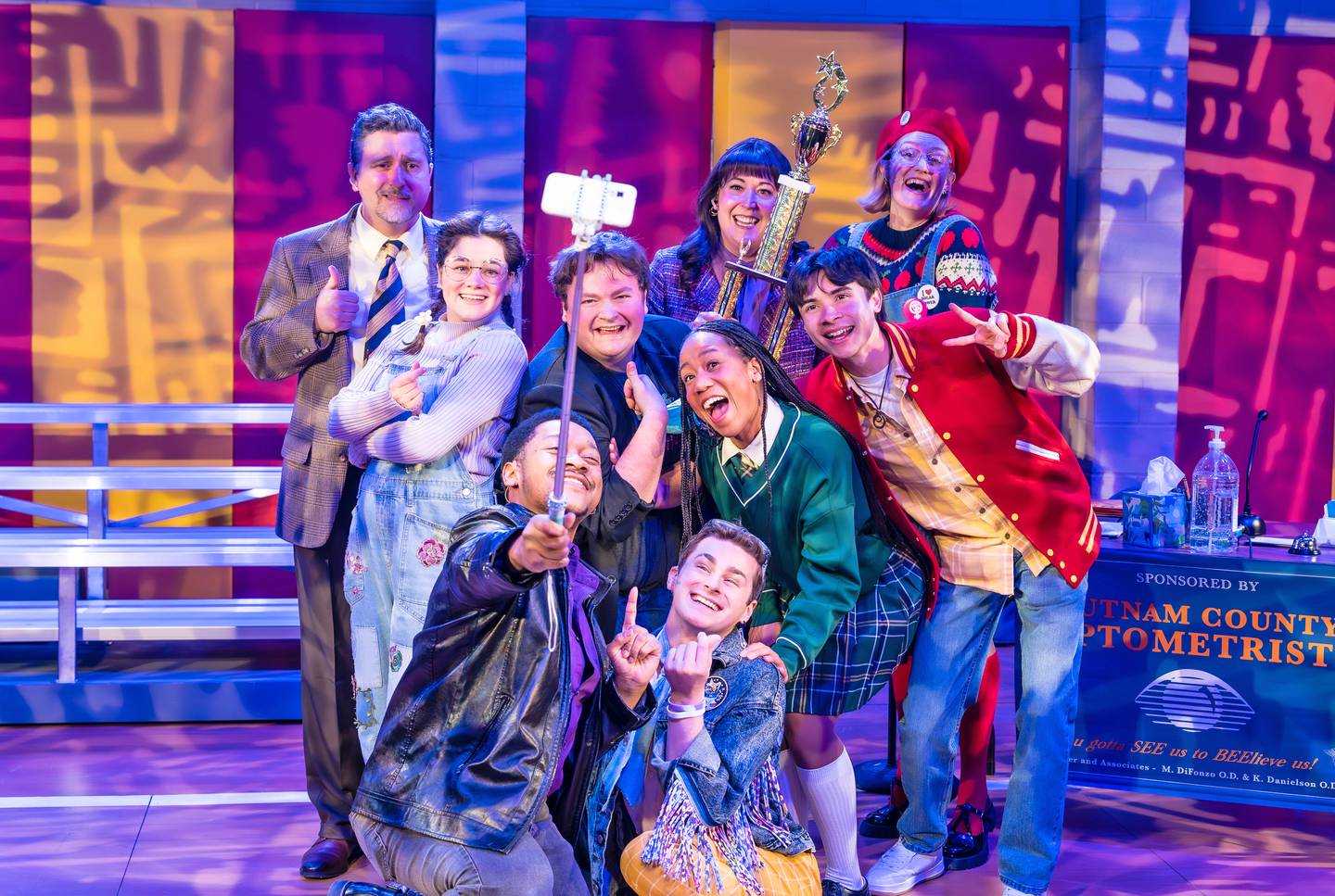 The 25th Annual Putnam County Spelling Bee, part of Paramount Theatre’s BOLD Series, is running now through April 27 at Paramount’s Copley Theatre, 8 E. Galena Blvd. in downtown Aurora. It features (front, kneeling) Naphtali Curry (left) as Mitch Mahoney, Ben Broughton as Leaf Coneybear, (middle, from left) Elizabeth Stenholt as Olive Ostrovsky,Teddy Gales as William Barfee, Shelbi Voss as Marcy Park, Nic Dantes as Chip Tolentino, (back, from left)  Jason Richards as Douglas Panch, Veronica Garza as Rona Lisa Perretti, and Ann Delaney as Logainne Schwartzandgrubenniere. Stephen Schellhardt directs. Tickets: paramountaurora.com or (630) 896-6666. Credit: Amy Nelson