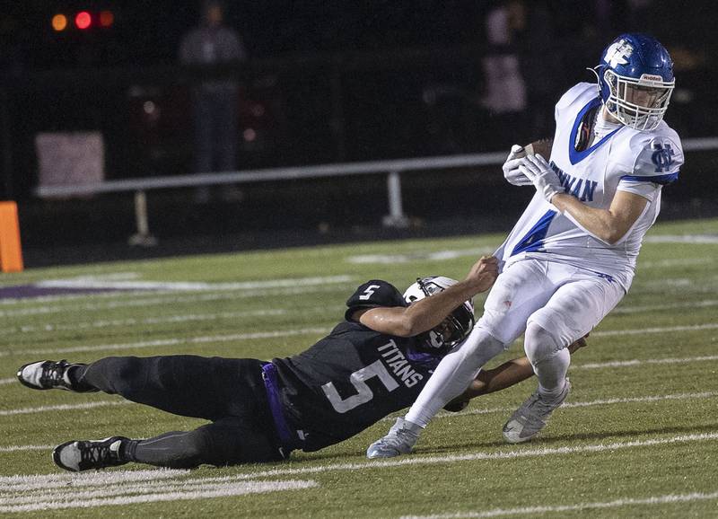 Newman’s Matthew Blackert is grabbed by the jersey by El Paso’s Aaden Adams Saturday, Nov. 8, 2025.