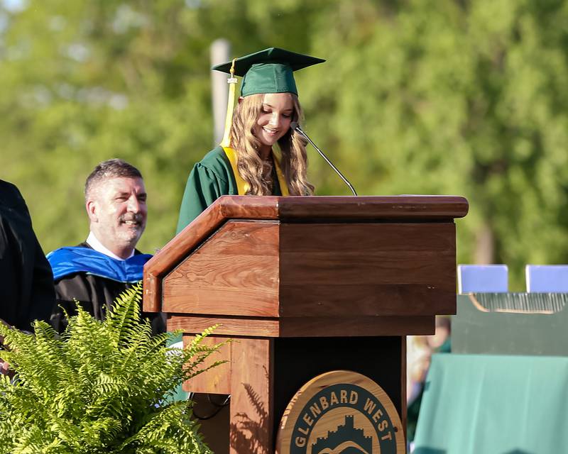 Madeline Yob presents the class gift during the Glenbard West High School graduation ceremony. May 19, 2022