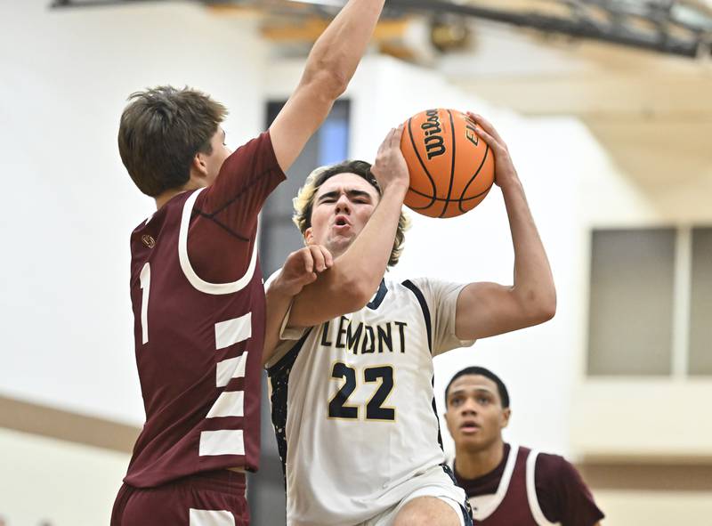 Lemont's Zane Schneider goes strong to the basket during the WJOL tournament championship game against Lockport on Saturday, NOV. 29, 2025, at Joliet.