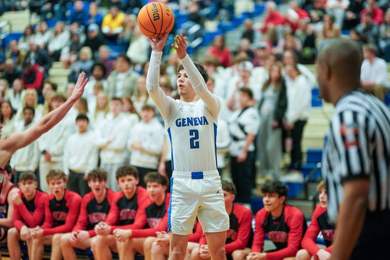 Geneva’s Gabe Jensen (2) shoots a three pointer against Batavia during a basketball game at Geneva High School on Friday, Feb. 7, 2025.