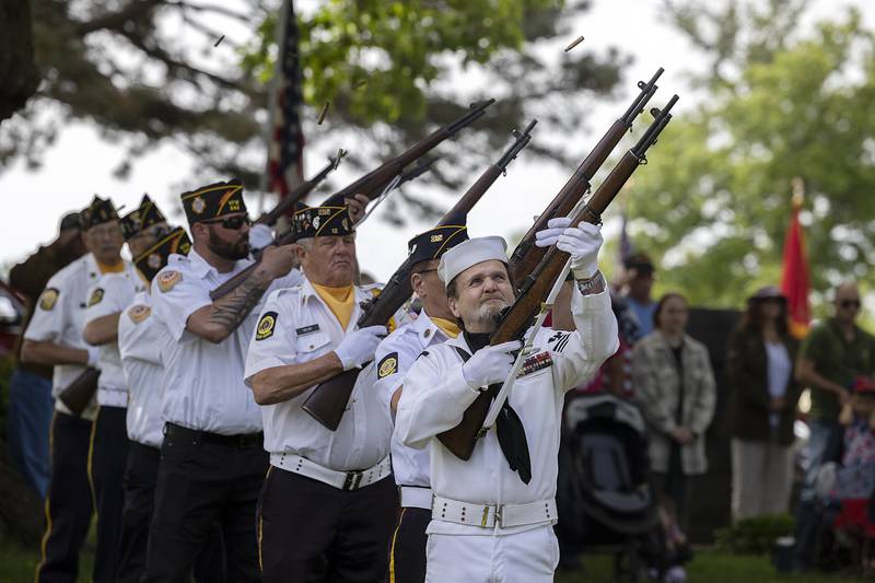 A rifle volley is held to honor the dead Monday, May 26, 2025, during a Memorial Day ceremony at Oakwood Cemetery in Dixon.