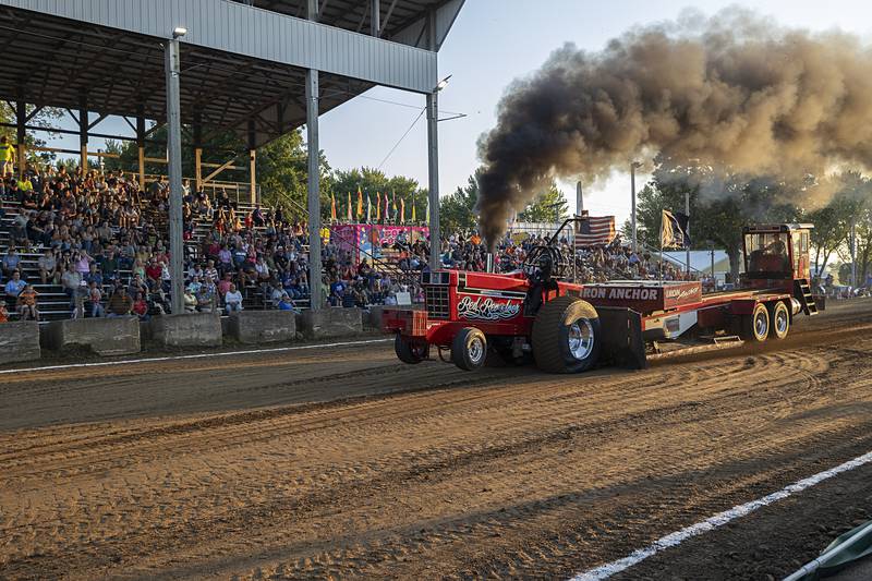 Bryce Ricklefs hauls down the track Wednesday, Aug. 7, 2024, in Milledgeville for the annual Carroll County tractor pulls.