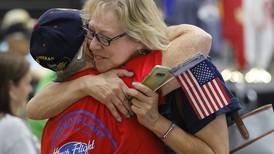 Veterans on Honor Flight trip to Washington, D.C., return to McHenry High School