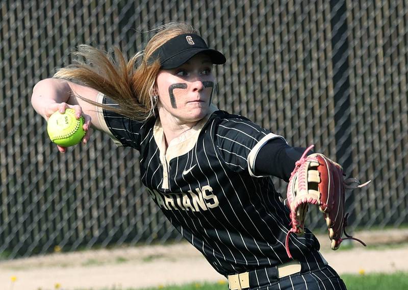 Sycamore's Ellison Hallahan gets the ball back into the infield Friday, May 2, 2025, during their game at DeKalb High School.