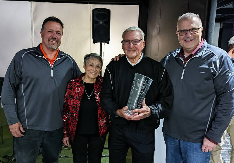 Mary and Ron Lehman (center) accept their award from Chris Caldwell (left), the President of the Channahon Park District Board of Commissioners and Mike Rittof, the President of the People for Channahon Parks Foundation.
