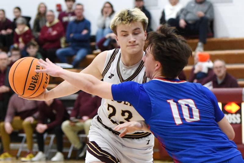 Watseka's Payton Schaumburg, left, keeps the ball out of reach of Iroquois West's Rylan Pheifer during the IHSA Class 2A Hoopeston Regional quarterfinals at Watseka Monday, Feb. 24, 2025.