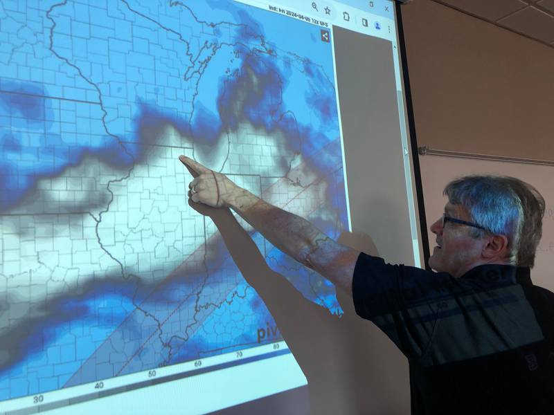 Paul Hamill of McHenry County College's Planetarium a weather model on Friday, April 5, showing what local condition might be like for viewing April 8's solar eclipse. The planetarium has a show called “Eclipses of the Sun” show, which explores the mechanisms behind an eclipse.