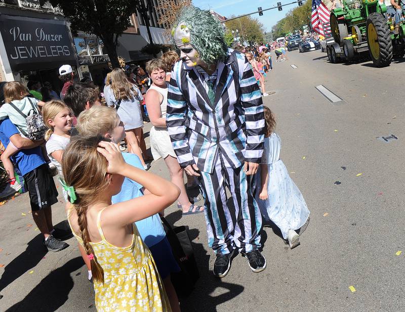 A costumed Beetlejuice stopped and visited those along the Fall Fest Parade route Sunday in Ottawa.