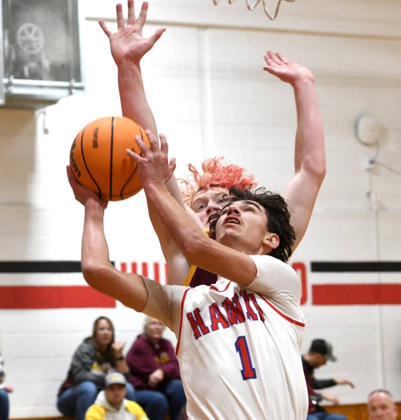 Oregon's Benny Olalde (1) puts up a shot against Stockton on Saturday, Dec. 13 at the 64th Annual Forreston Holiday Basketball Tournament held at Forreston High School.