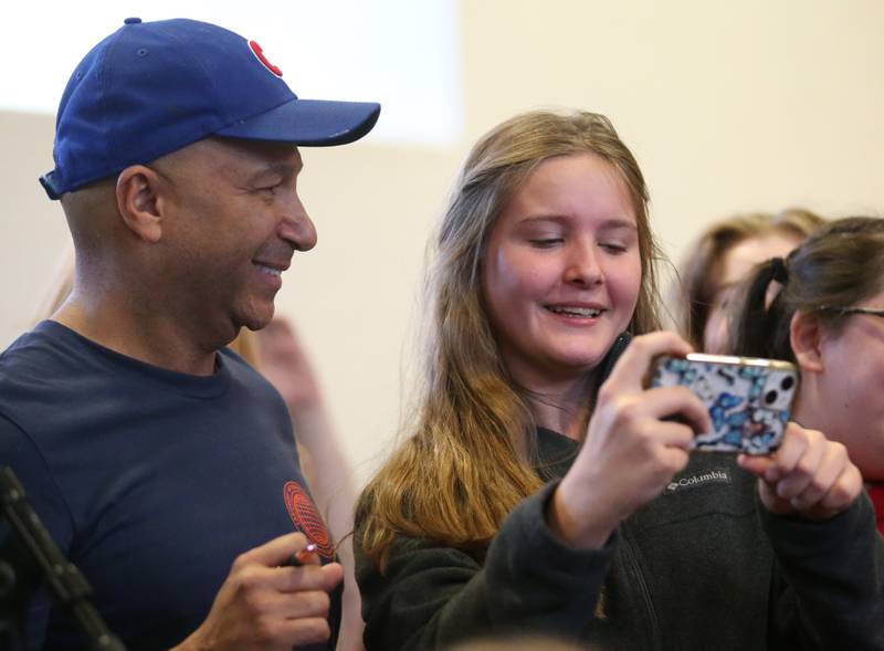Isabella Mumaugh takes a "selfie" with guitarist Tom Morello  on Thursday, Nov. 30, 2023. Morello is best known for his tenure with the rock bands Rage Against the Machine and Audioslave. Morello grew up in Marseilles before making it to the major music industry.