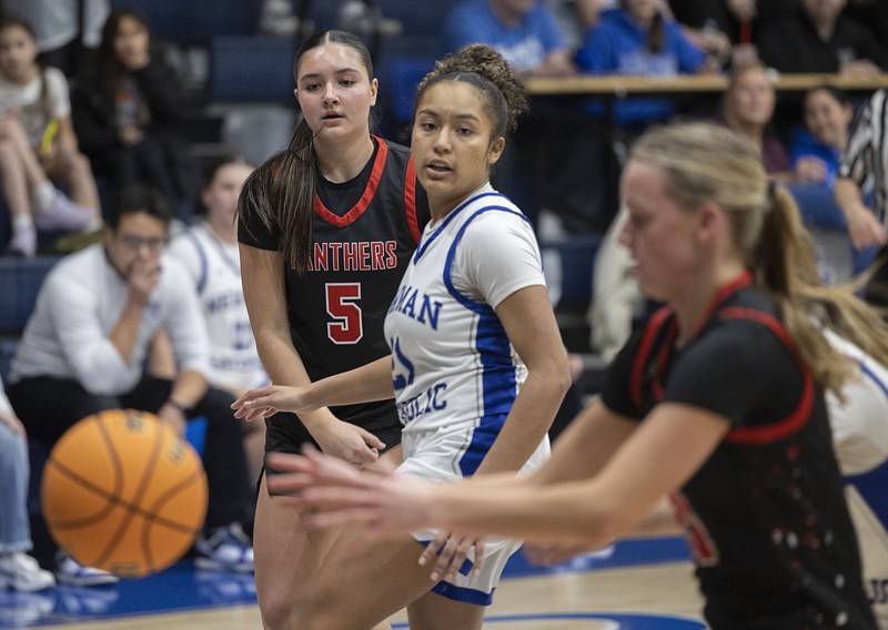 Erie-Prophetstown’s Ashlyn Johnson dishes off a pass to teammate Aubrey Huisman against Newman Thursday, Jan. 29, 2026.