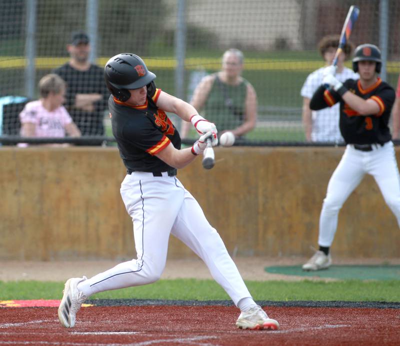 Batavia's Keegan Harp hits a homerun during a game against St. Charles North on Thursday, April 24, 2025 in Batavia.