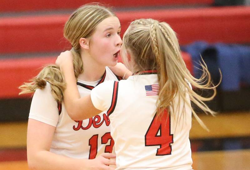 Hall's Caroline Morris reacts with teammate Charlie Pellegrini after hitting the game winning shot against Princeton on Monday, Jan. 6, 2025 at Hall High School.