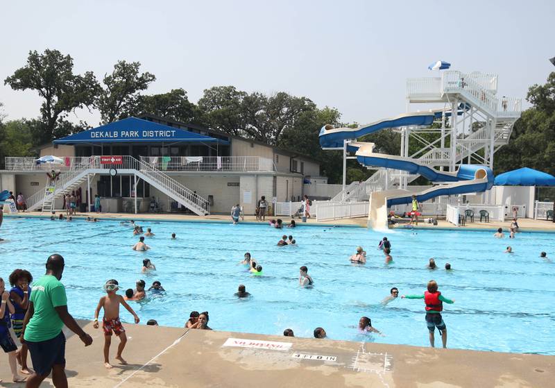 High temperatures make for a crowded pool Tuesday, July 25, 2023, at Hopkins Pool in DeKalb.