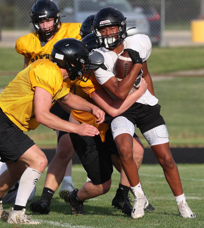 Lena-Winslow and Sycamore scrimmage Thursday, July 24, 2025, during a joint practice with Byron, Lena-Winslow and Sycamore at Sycamore High School.