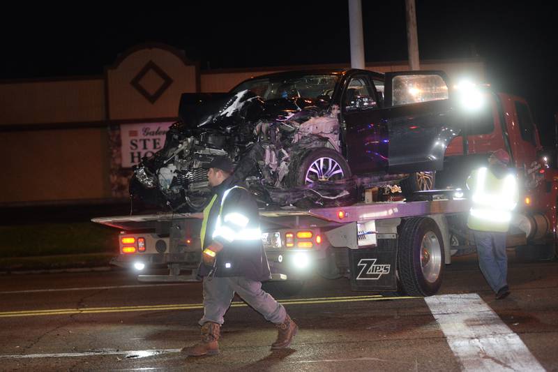 Emergency personnel respond to a three-vehicle crash about 5 p.m. Tuesday, Dec. 5, 2023, at the intersection of North Galena Avenue and Court Street in Dixon.