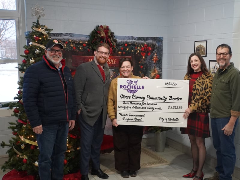 City of Rochelle presents facade grant to Vince Carney Community Theater