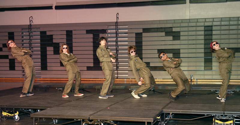 (l-r) Seth Carlson, Finn Gannon, Andres Alba, Nick Johnson, Matt Manugas and Mikey Hanania perform in the Mr. Kaneland 2023 competition on Friday, March 10, 2023 in Maple Park.