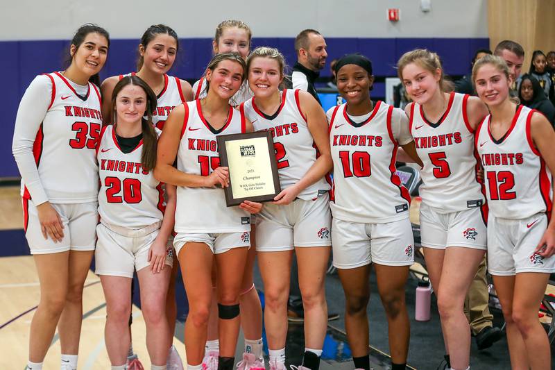 Lincoln Way Central poses with the WJOL Tournament Championship game plaque after defeating Providence Catholic. Nov 18, 2023.