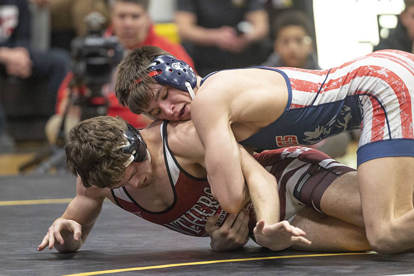 Morrison’s Caleb Modglin (top) works on Erie’s Tristan Hovey in the 150 pound finals Saturday, Jan. 31, 2026, during the Class 1A Wrestling Regionals at Riverdale High School. Modglin won 9-6.