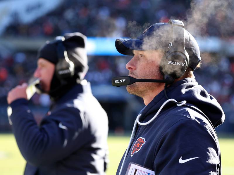 Chicago Bears head coach Ben Johnson (right) and defensive coordinator Dennis Allen watch the defense pin the Cleveland Browns deep in their own end during their game Sunday, Dec. 14, 2025, at Soldier Field in Chicago.