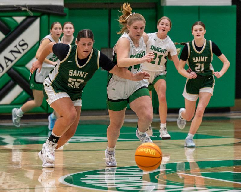 St. Bede's Ava Balestri (52) and Sophia Buck (14) of Dwight run after loose ball on Monday, January 19, 2026 at the Krese Memorial Gymnasium in Dwight.