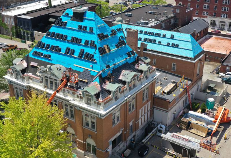 An aerial view of the La Salle City Hall building as crews begin to shingle it on Thursday, May 11, 2023 in La Salle.