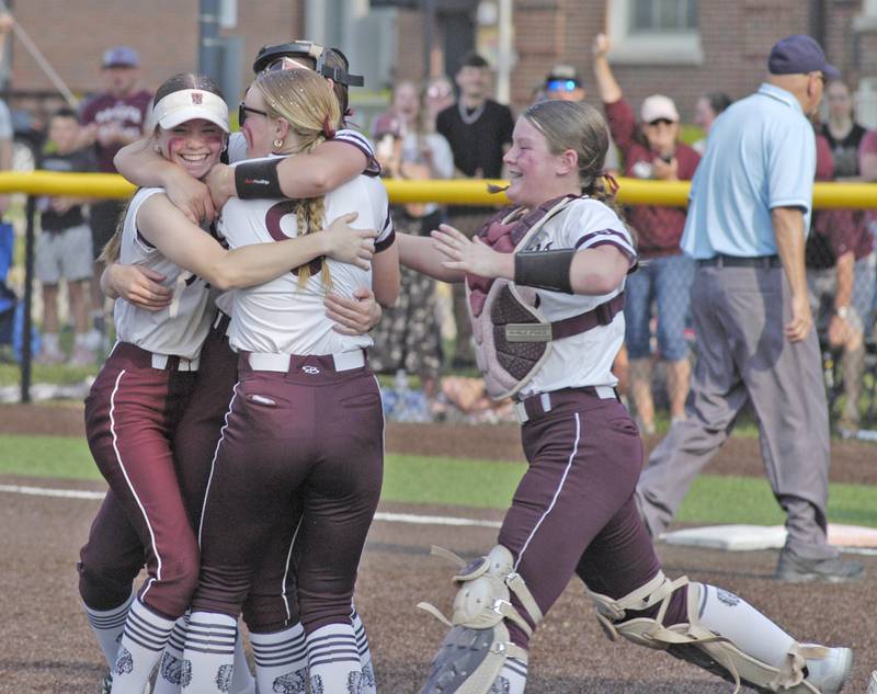 Dakota teammates celebrate the win. Dakota and Henry-Senachwine softball met in  Illinois  Class 1A Super Sectional in Sterling on June 2, 2025. Dakota won the contest 2-0.